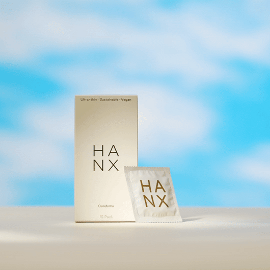 A gif of a HANX vegan condom being placed next to a 10 pack of condoms. Vegan, sustainable and ultra-thin, HANX condoms are top-rated.